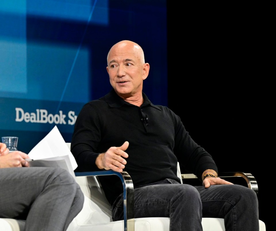 NEW YORK, NEW YORK - DECEMBER 04: Jeff Bezos speaks onstage during The New York Times Dealbook Summit 2024 at Jazz at Lincoln Center on December 04, 2024 in New York City. (Photo by Eugene Gologursky/Getty Images for The New York Times)