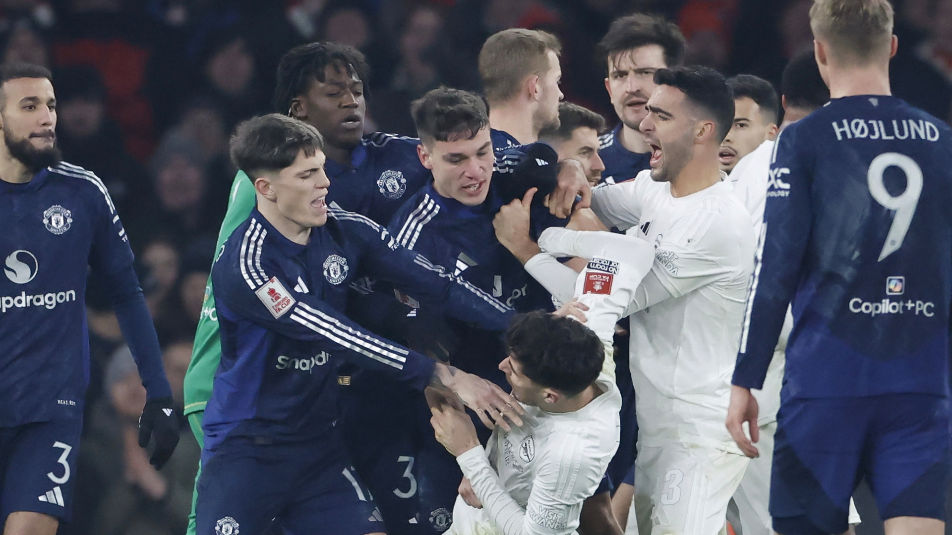 Arsenal and Man Utd stars in furious brawl as Harry Maguire goes for Kai Havertz as players hit the deck in mad scramble