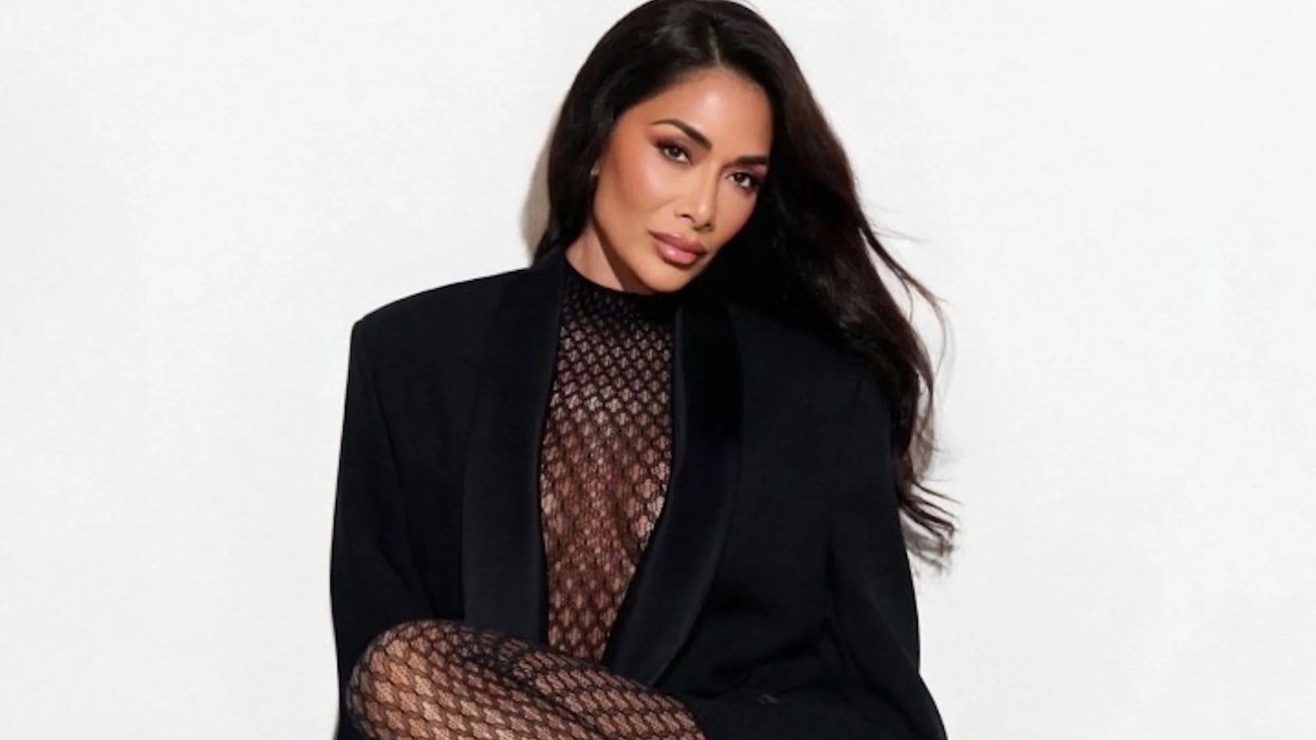 Nicole Scherzinger, 46, wows as she goes braless in sexy lace bodysuit