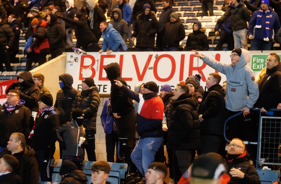 Angry Rangers fans at a football match.