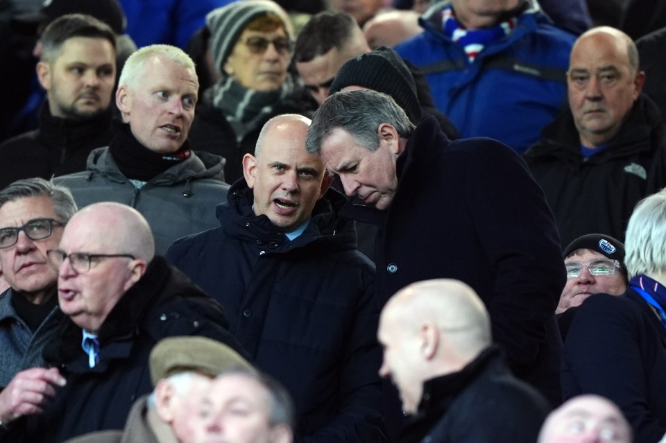 Rangers CEO Patrick Stewart and Chairman Fraser Thornton at a soccer match.