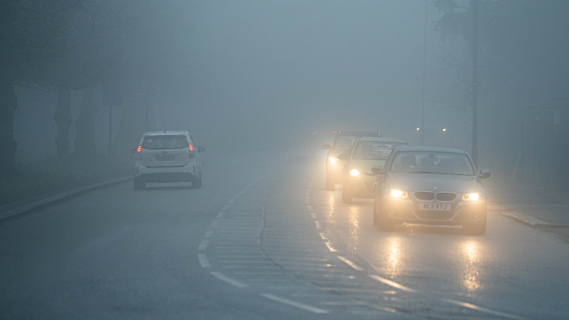 Urgent warning to drivers as heavy fog covers the UK - as motorists are told to follow 2-second rule & wind down windows