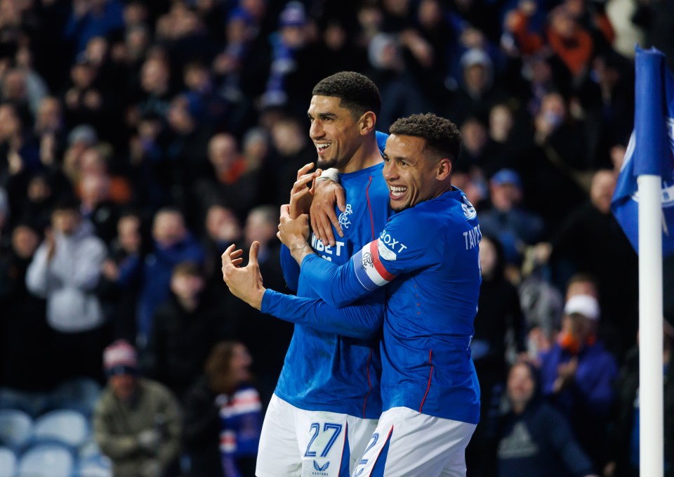 Leon Balogun and James Tavernier celebrating a goal.