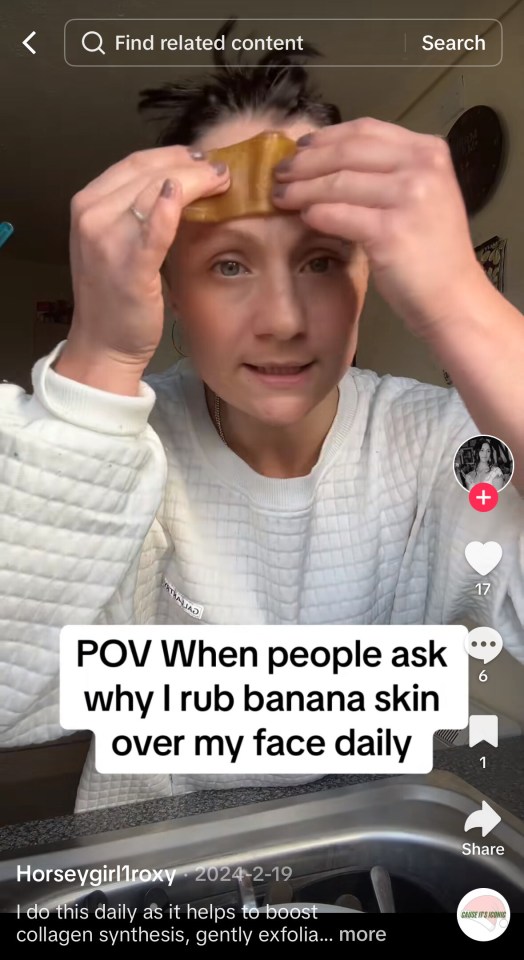 Woman rubbing banana peel on her face.