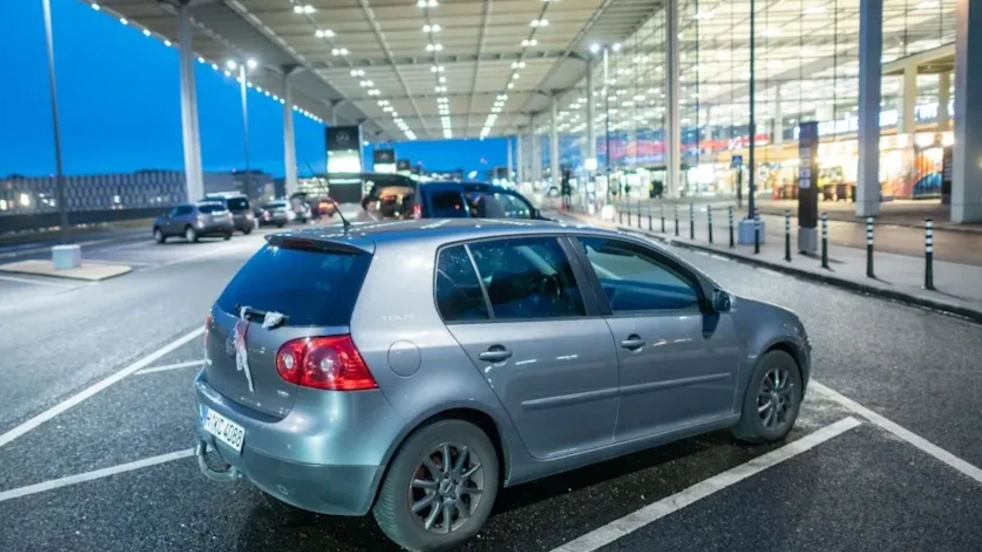 Golf parked at entrance to international airport in short-term spot for a YEAR racks up eye-watering six-figure fine