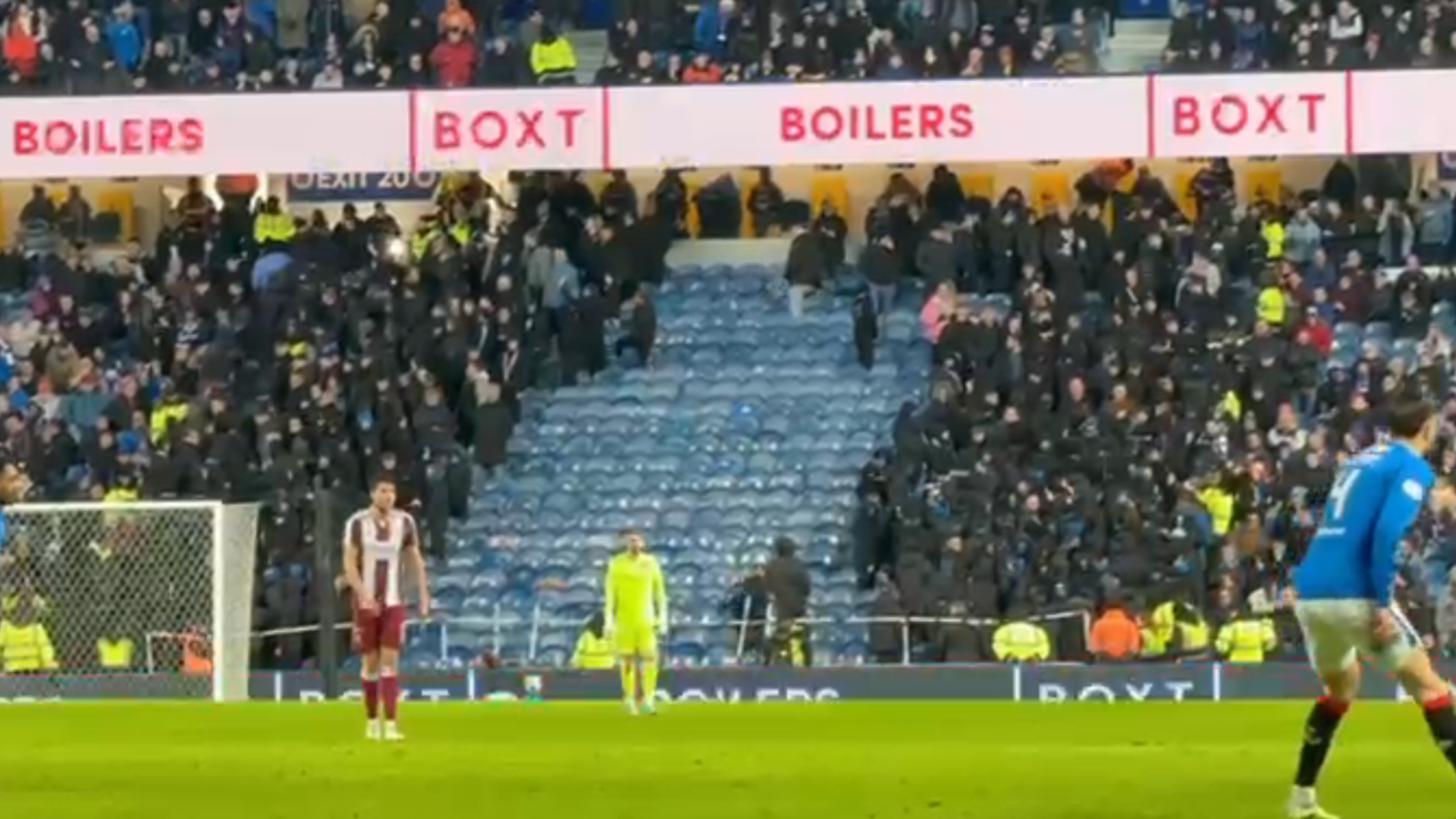 Moment fuming Rangers fans dramatically WALK OUT of Ibrox during game as they stage major protest against club's board