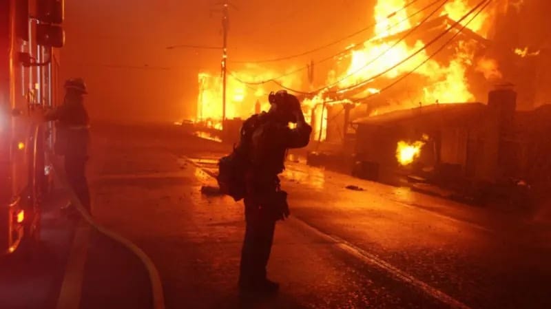 Thousands Flee Homes As Wildfires Ravage Los Angeles Suburbs